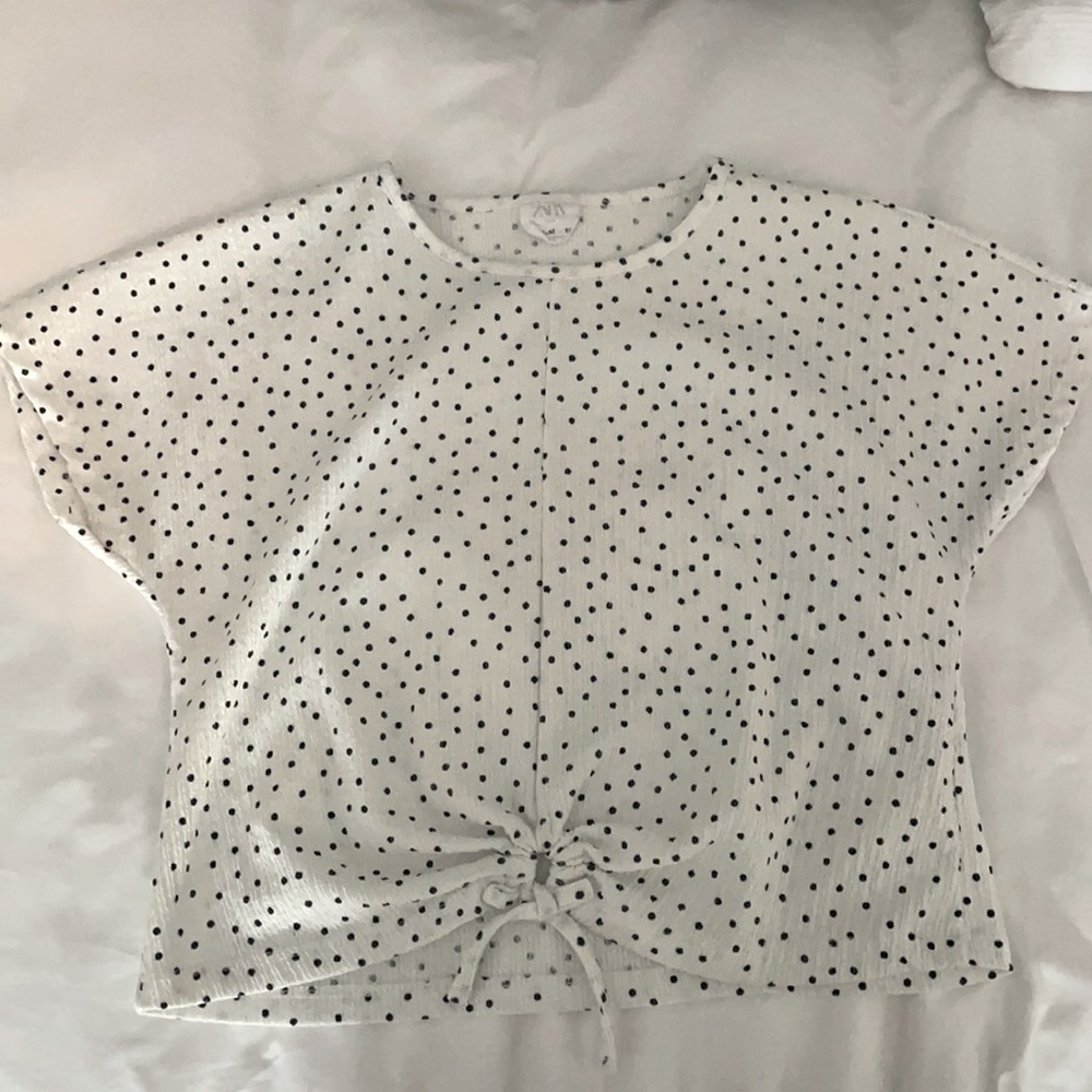 White and navy short sleeve girls shirt with tie.